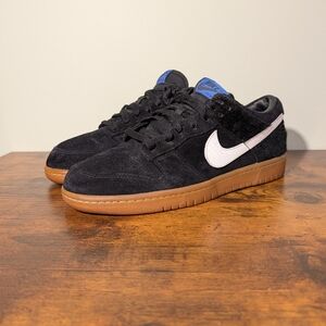 Nike Black Sneakers with White Logo and Gum Sole
